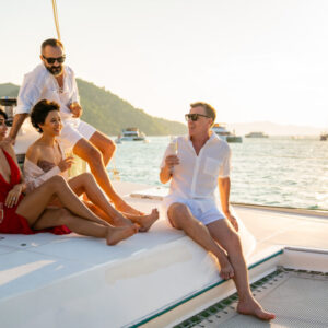 Sunset on shared catamaran (Singles 45-55 years old)